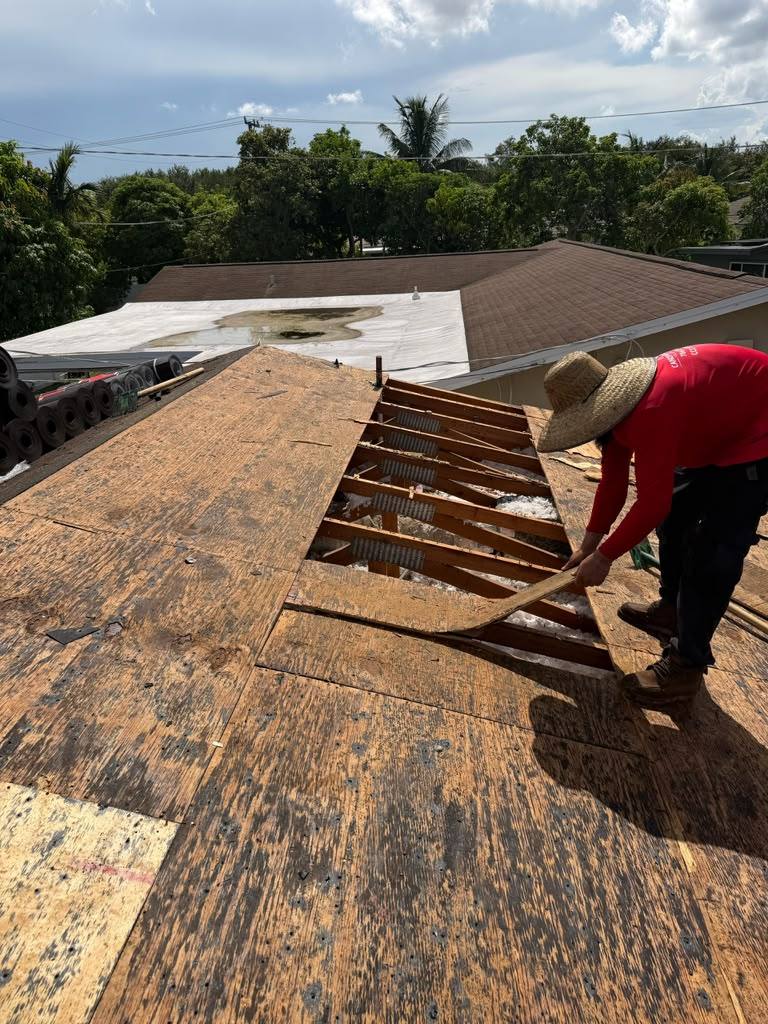 HD Contracting Roofing crew working on a South Florida roof